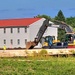 Final exterior grading takes place at fiscal year 2020-funded barracks project at Fort McCoy