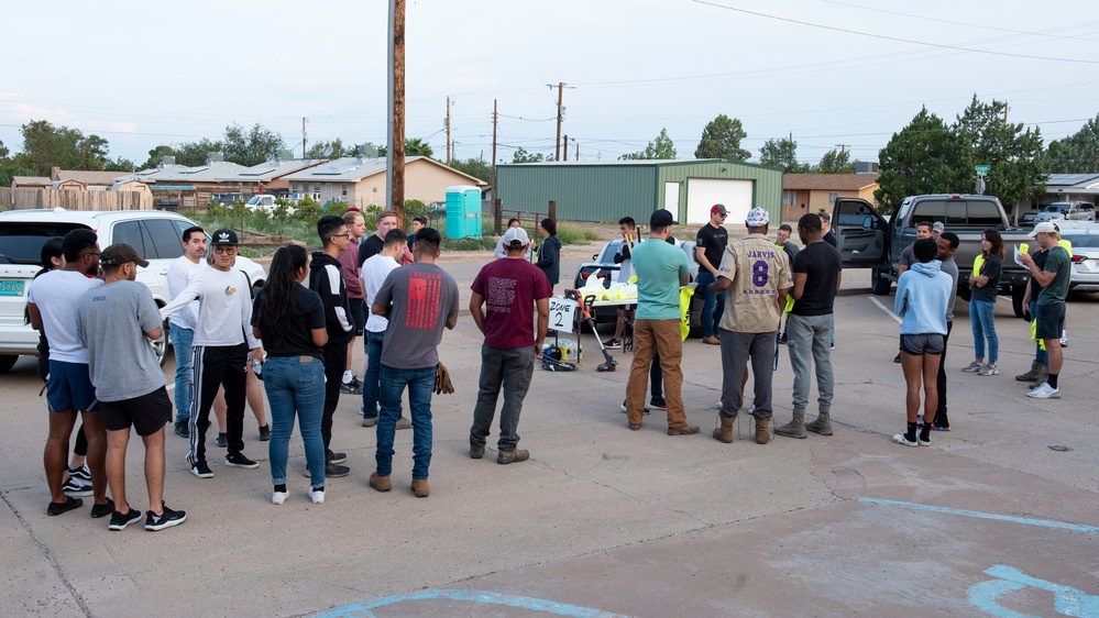 Holloman volunteers help clean surrounding communities during the Day of Caring