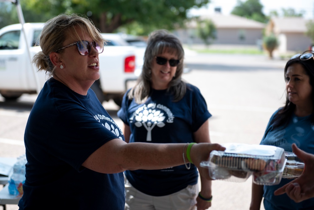 Holloman volunteers help clean surrounding communities during the Day of Caring