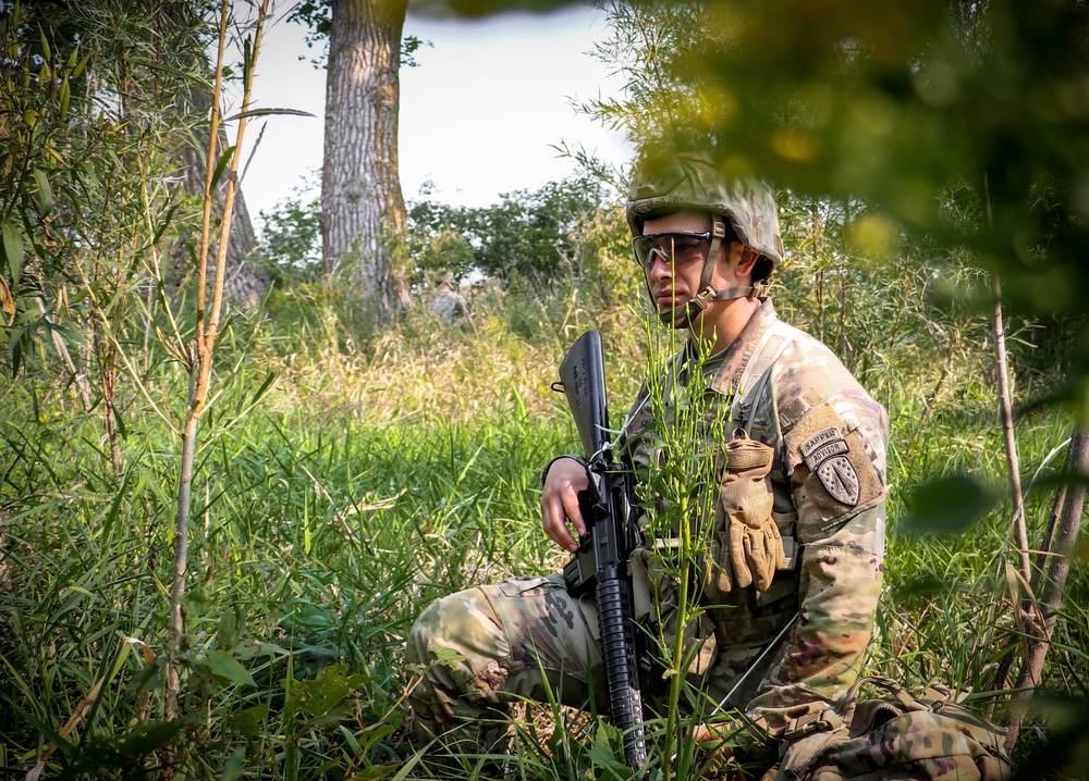 U.S. Soldiers pull security during Pathfinder field exercise