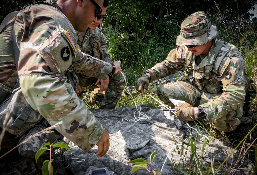 U.S. Soldiers conduct sling load field exercise during Pathfinder course at Camp Dodge
