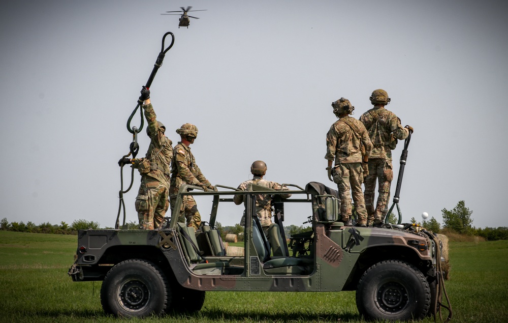 U.S. Soldiers conduct sling load field exercise during Pathfinder course at Camp Dodge