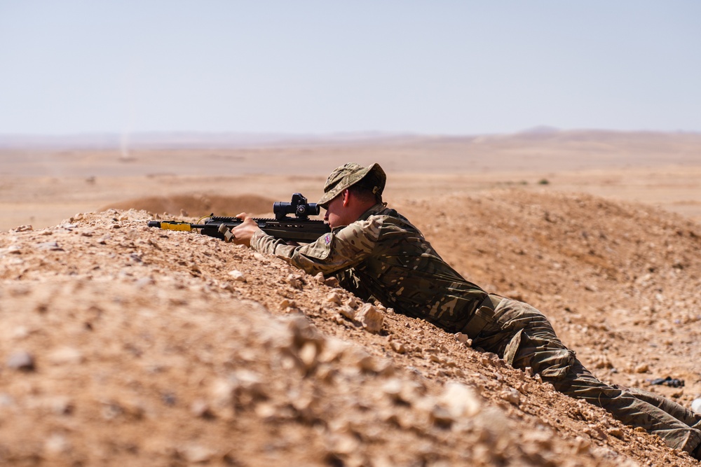 British soldier scans down range