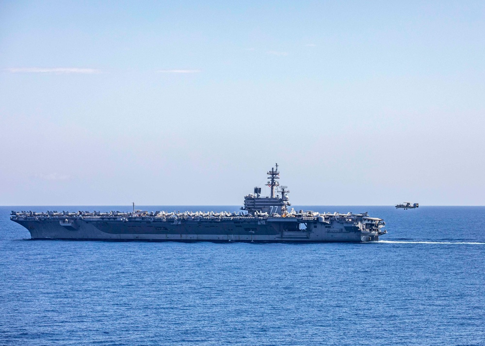 E-2D Hawkeye and an E/A-18G Growler land aboard USS George H.W. Bush (CVN 77)