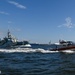 Coast Guard crews escort ships out of Baltimore Harbor during Fleet Week 2022