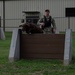 Navy MWD handler conducts training