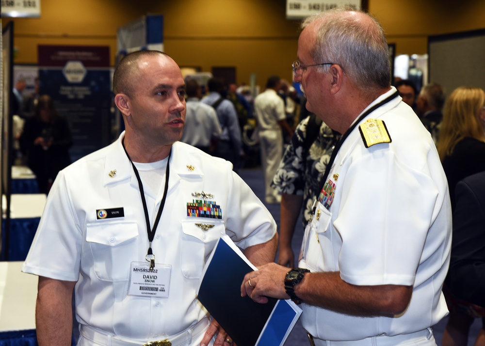 Navy Surgeon visits with NAMRU San Antonio during 2022 Military Health System Research Symposium