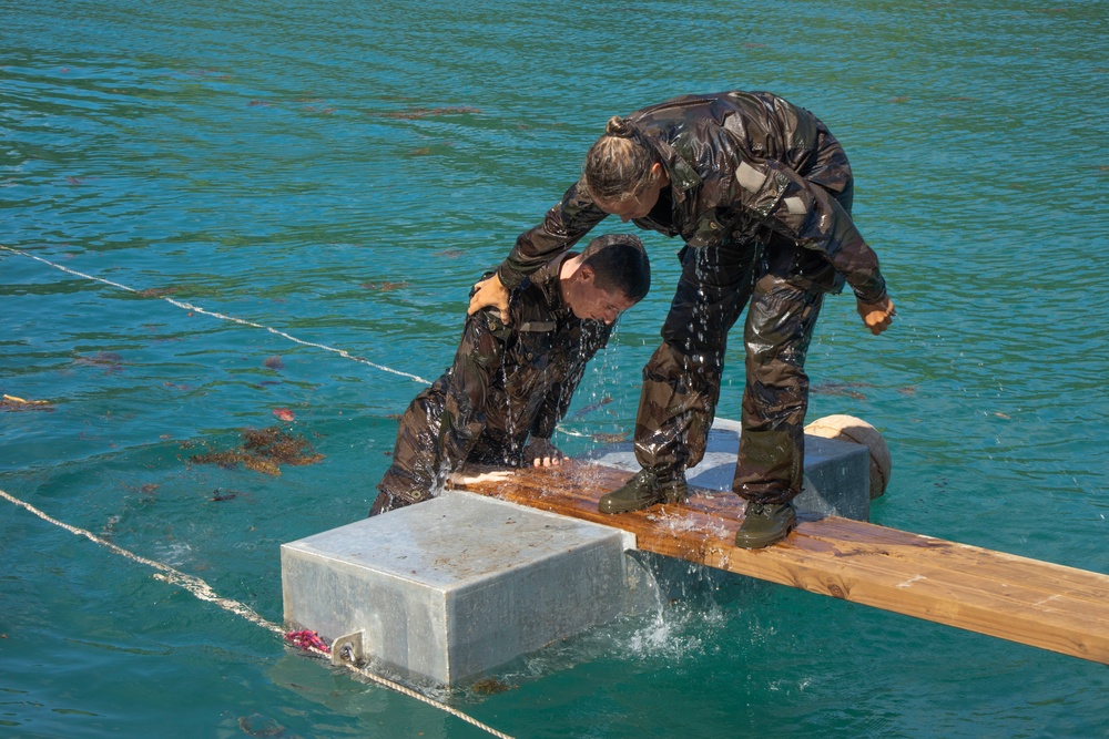 MARFORPAC Marines participate in Water Parkour Course during the French Armed Forces Aito Course