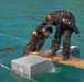 MARFORPAC Marines participate in Water Parkour Course during the French Armed Forces Aito Course