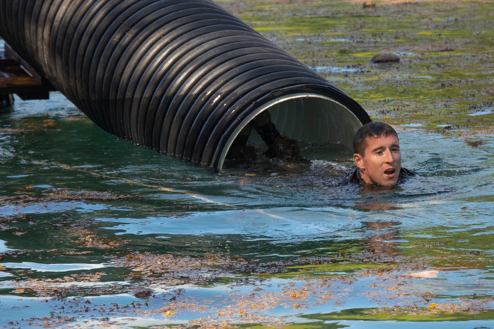 MARFORPAC Marines participate in Water Parkour Course during the French Armed Forces Aito Course