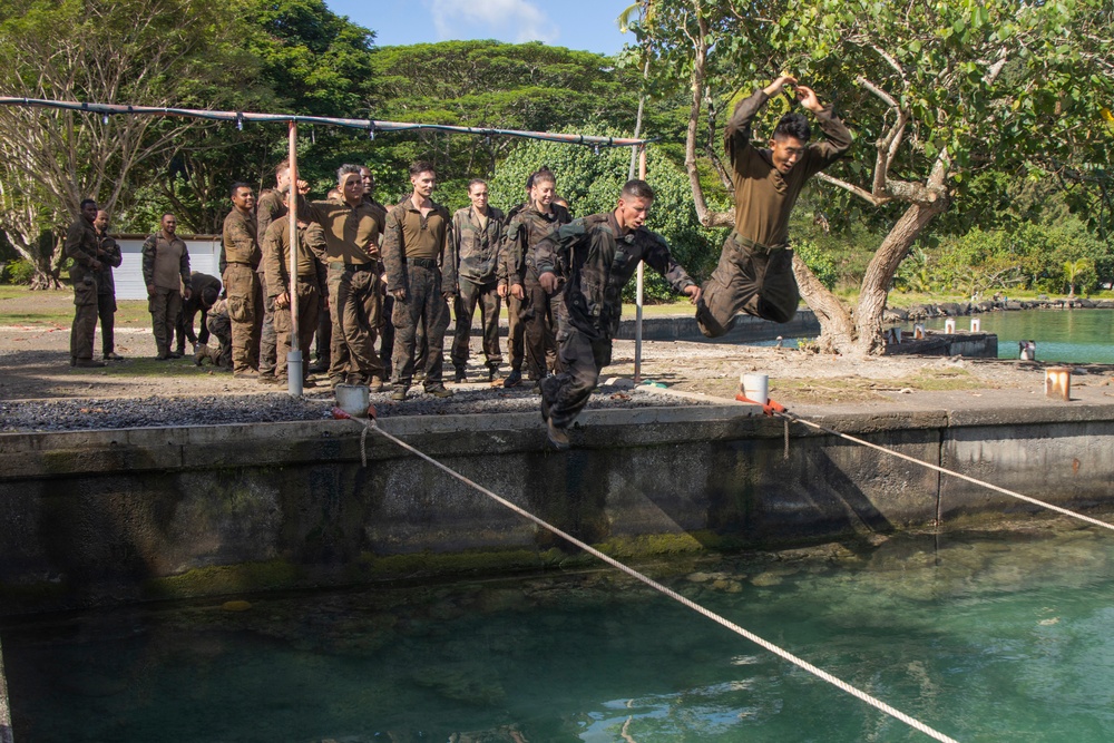 MARFORPAC Marines participate in Water Parkour Course during the French Armed Forces Aito Course
