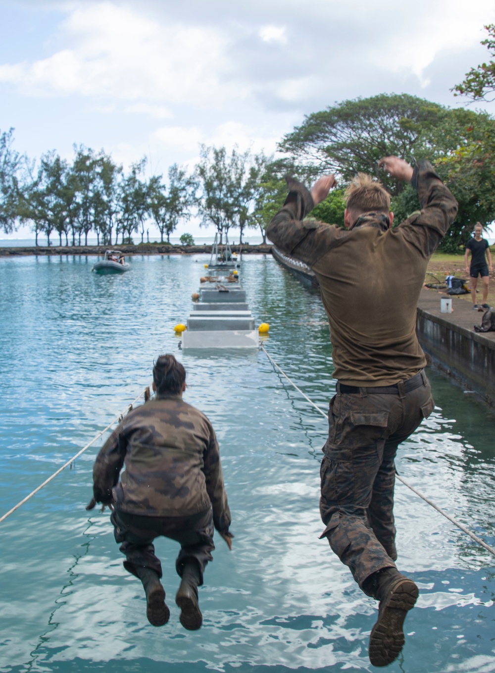 MARFORPAC Marines participate in Water Parkour Course during the French Armed Forces Aito Course