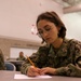 USS George Washington Sailors take Navy Advancement Exam