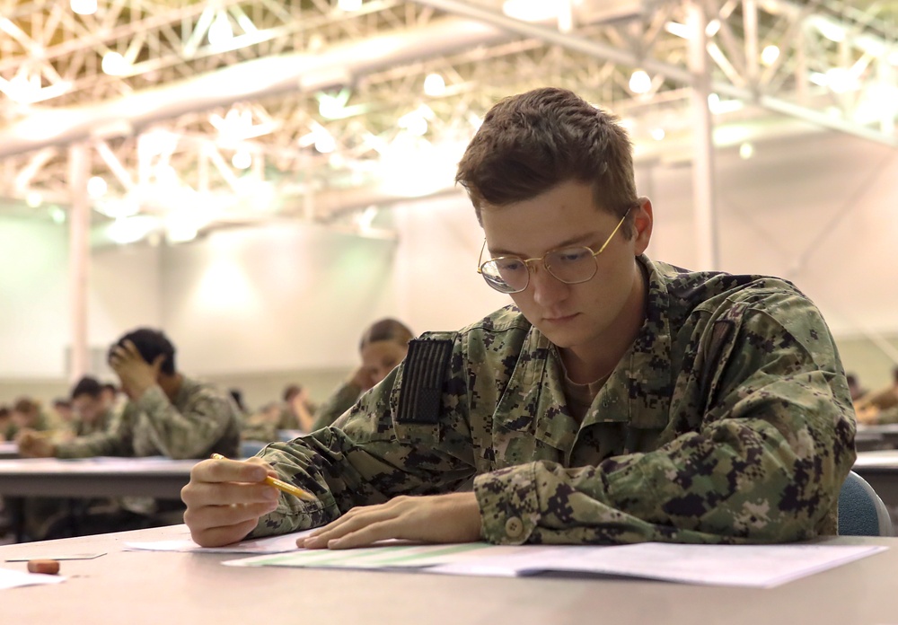 USS George Washington Sailors take Navy Advancement Exam