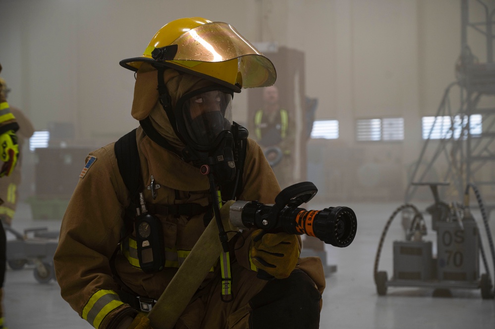 36th Civil Engineer Squadron firefighters conduct fire response procedures during Exercise SLING STONE 22-08