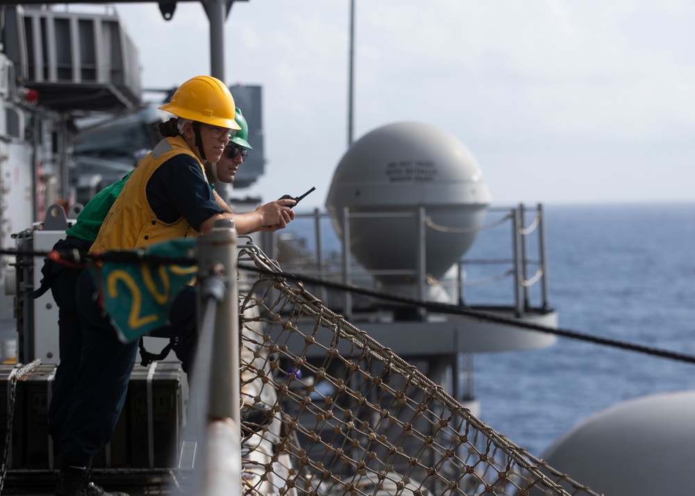 USS Tripoli conducts replenishment-at-sea with USNS Carl Brashear