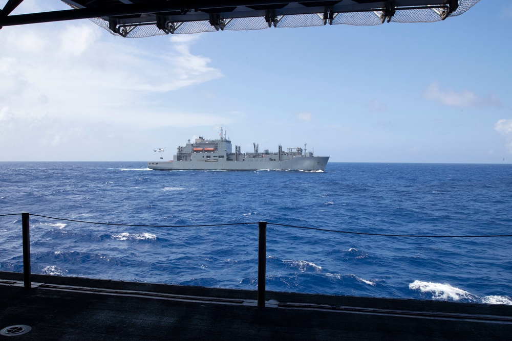 USS Tripoli Conducts Replenishment-at-Sea with USNS USNS Carl Brashear