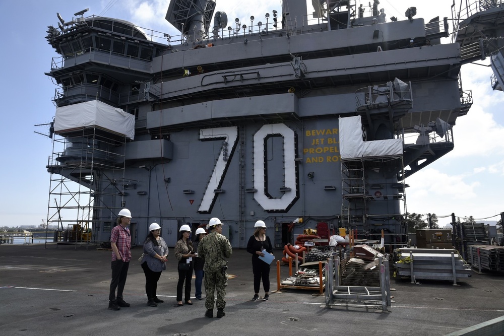 Lt. Ryan Le gives tour of the USS Carl Vinson (CVN 70) to NAVSUP FLC SD GDSC employees on Sept. 14.