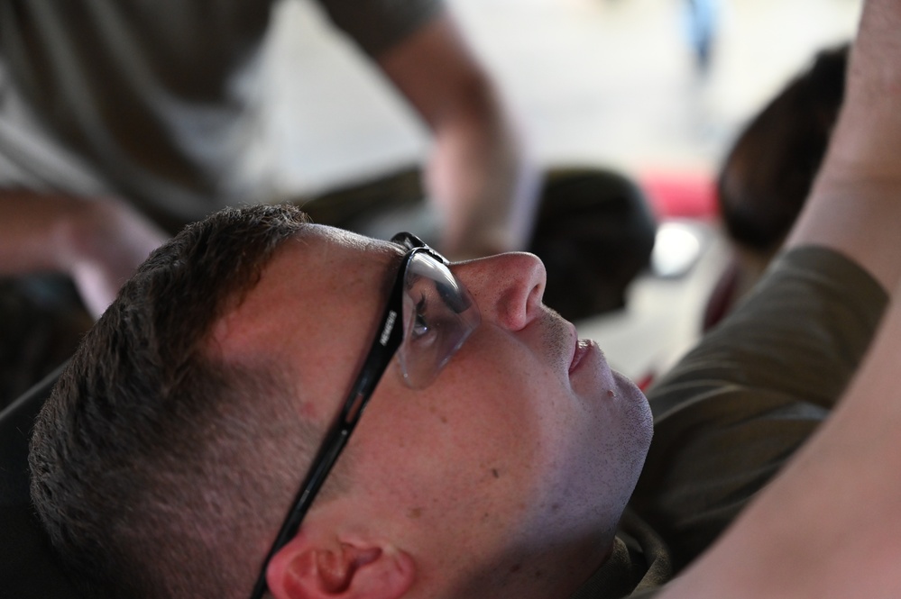 Airmen Perform Maintenance During an ISO Inspection