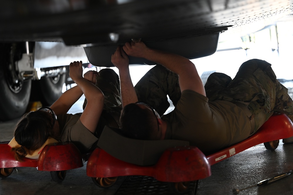 Airmen Perform Maintenance During an ISO Inspection