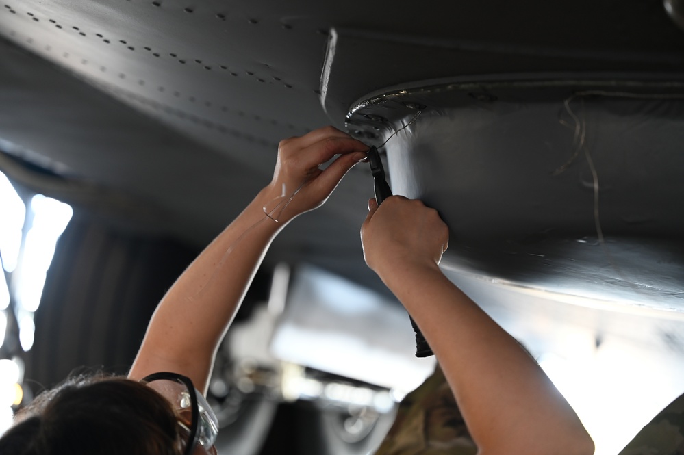 Airmen Perform Maintenance During an ISO Inspection