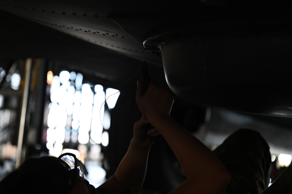 Airmen Perform Maintenance During an ISO Inspection