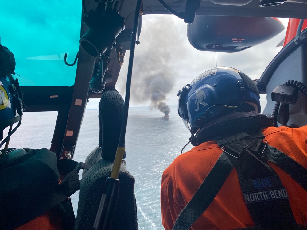 Air Station North Bend MH-65 aircrew rescues 2 from boat fire off Gold Beach, OR