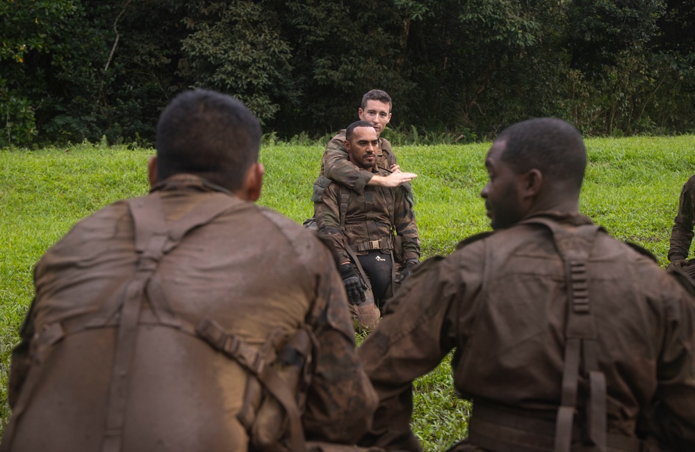 MARFORPAC Marines participate in hand-to-hand combat training during the French Armed Forces Aito Course