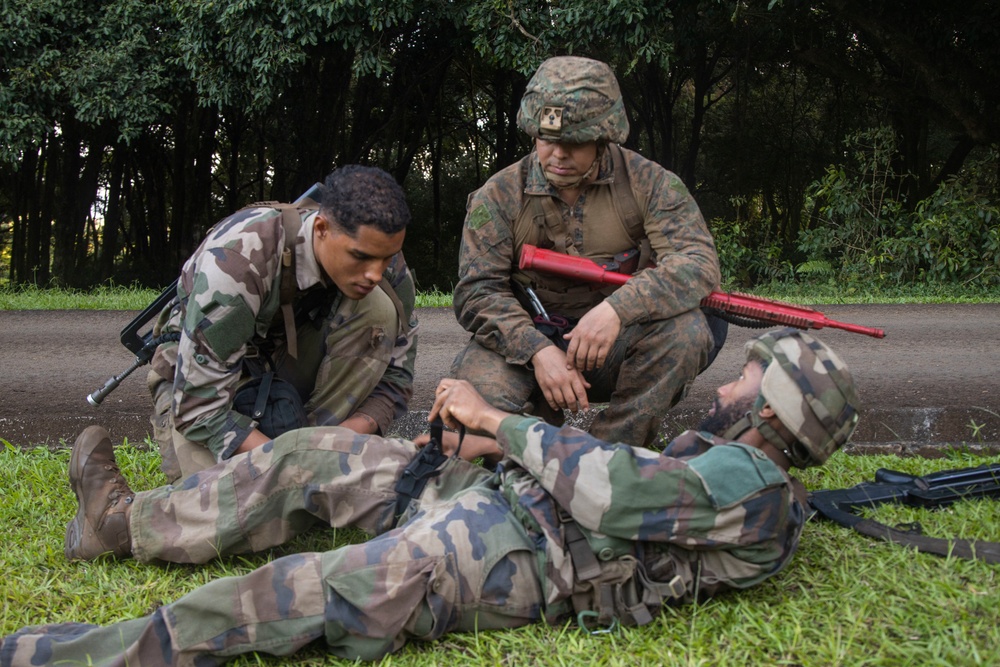 MARFORPAC Marines participate in combat casualty course during the French Armed Forces Aito Course