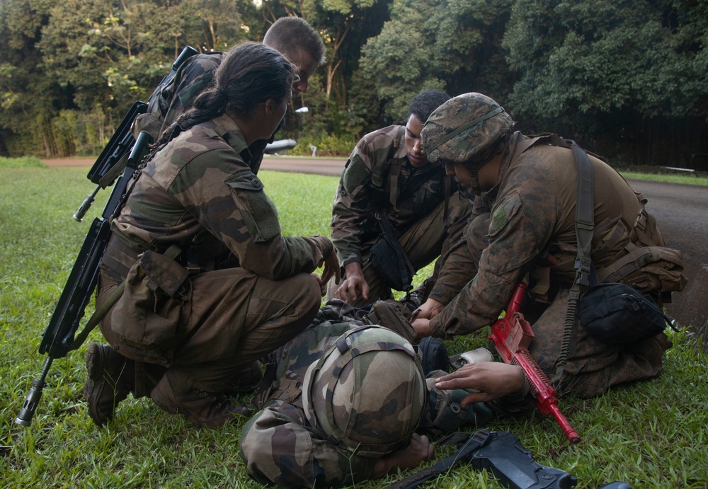 MARFORPAC Marines participate in combat casualty course during the French Armed Forces Aito Course