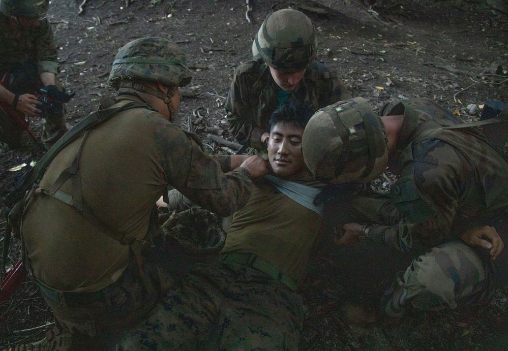 MARFORPAC Marines participate in combat casualty course during the French Armed Forces Aito Course