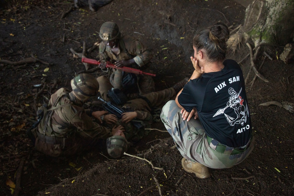 MARFORPAC Marines participate in combat casualty course during the French Armed Forces Aito Course