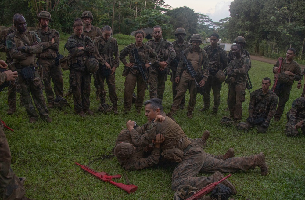 MARFORPAC Marines participate in combat casualty course during the French Armed Forces Aito Course