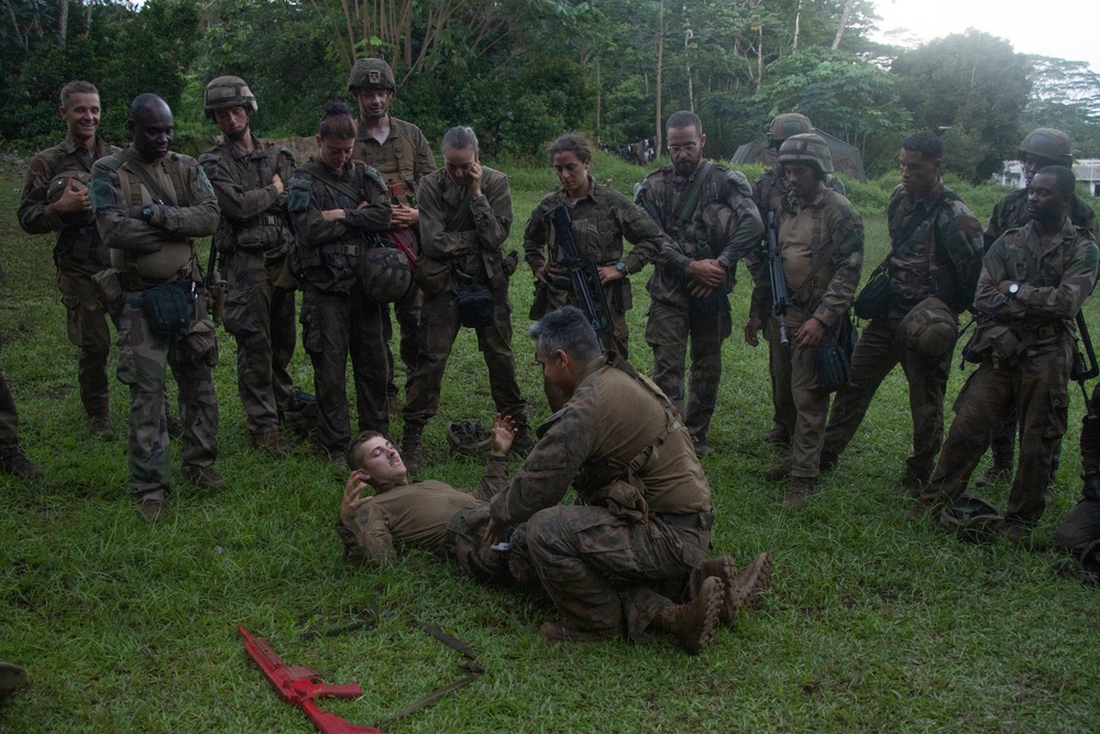 MARFORPAC Marines participate in combat casualty course during the French Armed Forces Aito Course