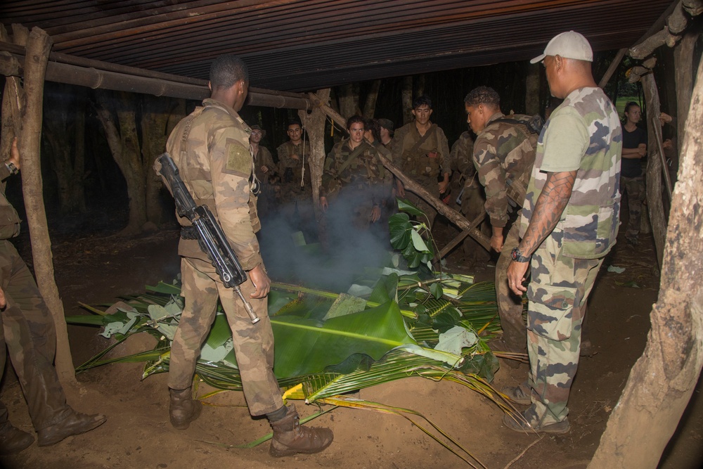 MARFORPAC Marines prepare traditional Polynesian meal during the French Armed Forces Aito Course