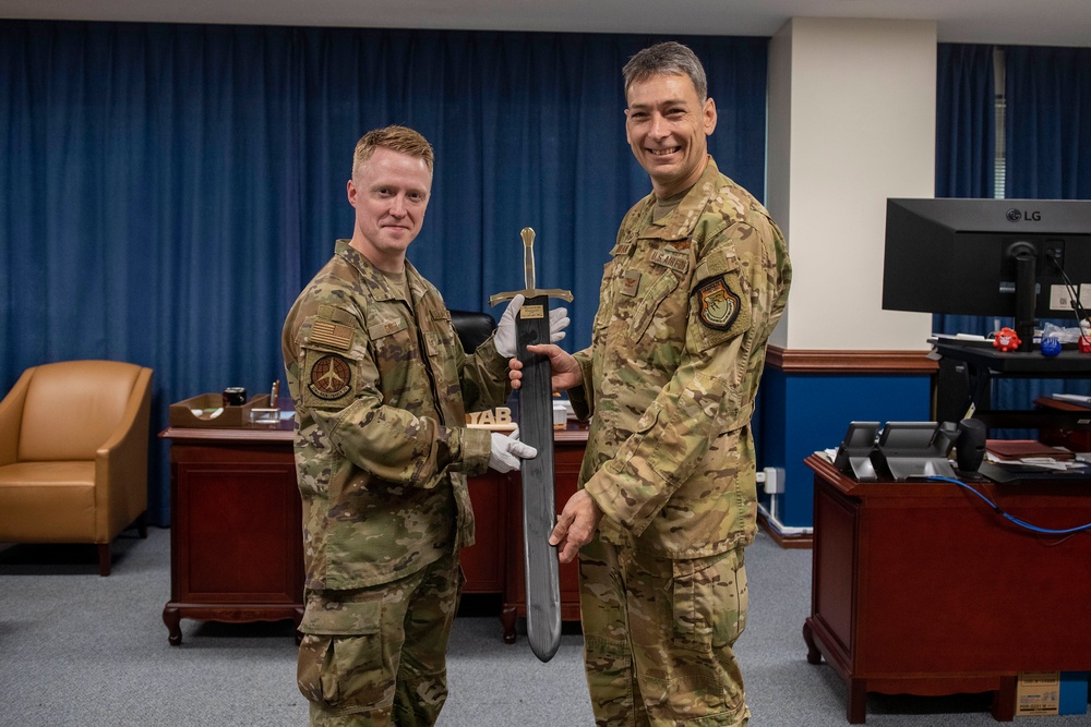 Forged In History: 374th MXS Airman yields new ceremonial sword for Yokota