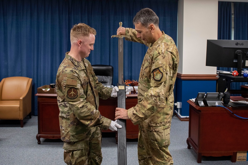 Forged In History: 374th MXS Airman yields new ceremonial sword for Yokota