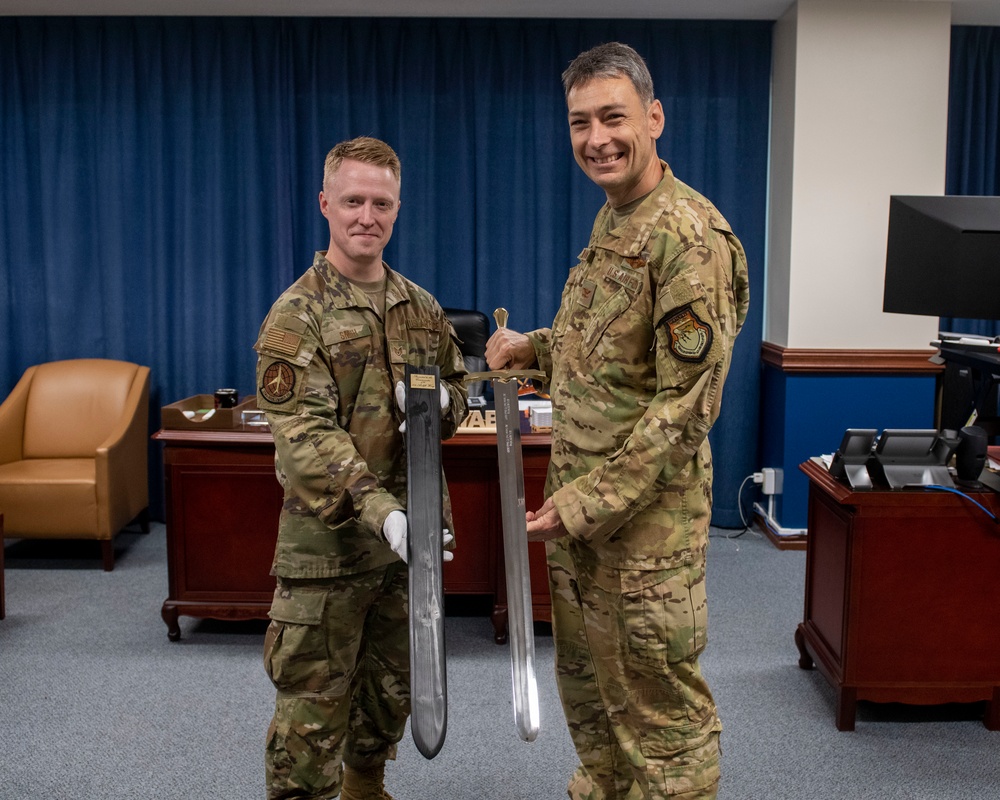 Forged In History: 374th MXS Airman yields new ceremonial sword for Yokota