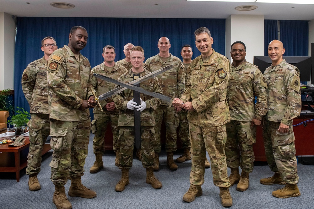 Forged In History: 374th MXS Airman yields new ceremonial sword for Yokota