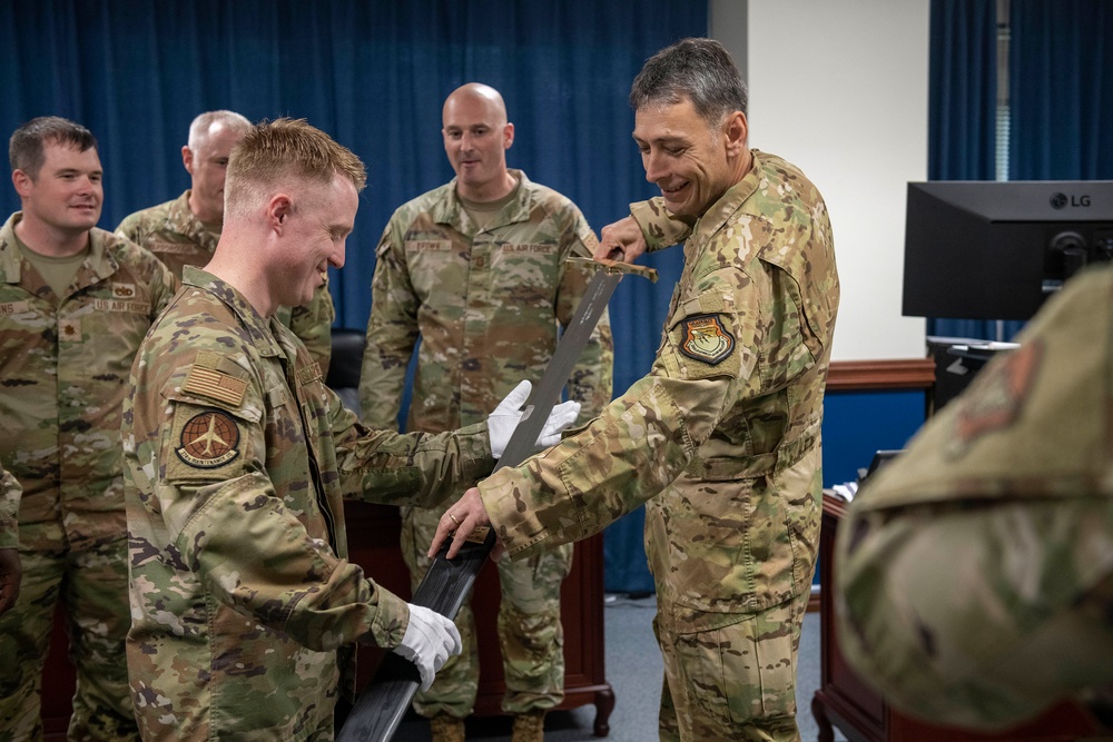 Forged In History: 374th MXS Airman yields new ceremonial sword for Yokota