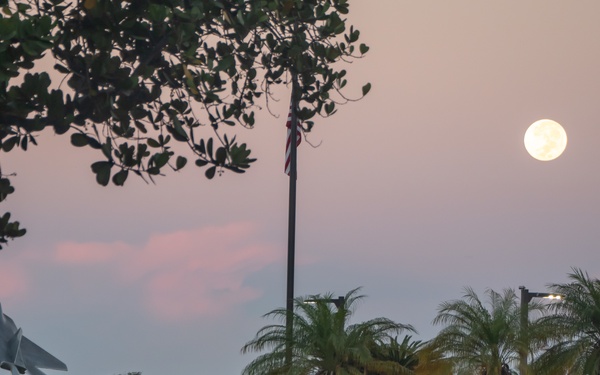 Harvest moon appears during role call