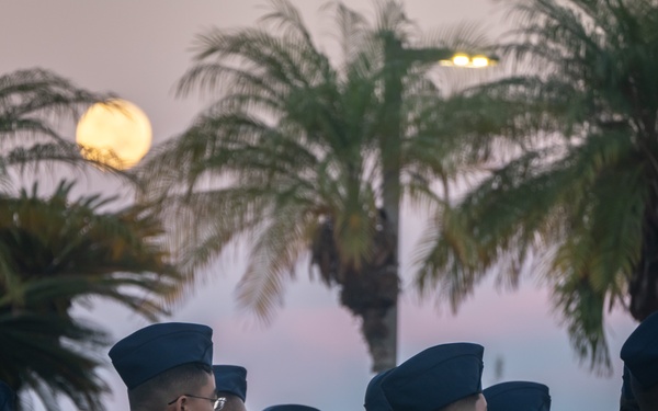 Harvest moon appears during role call