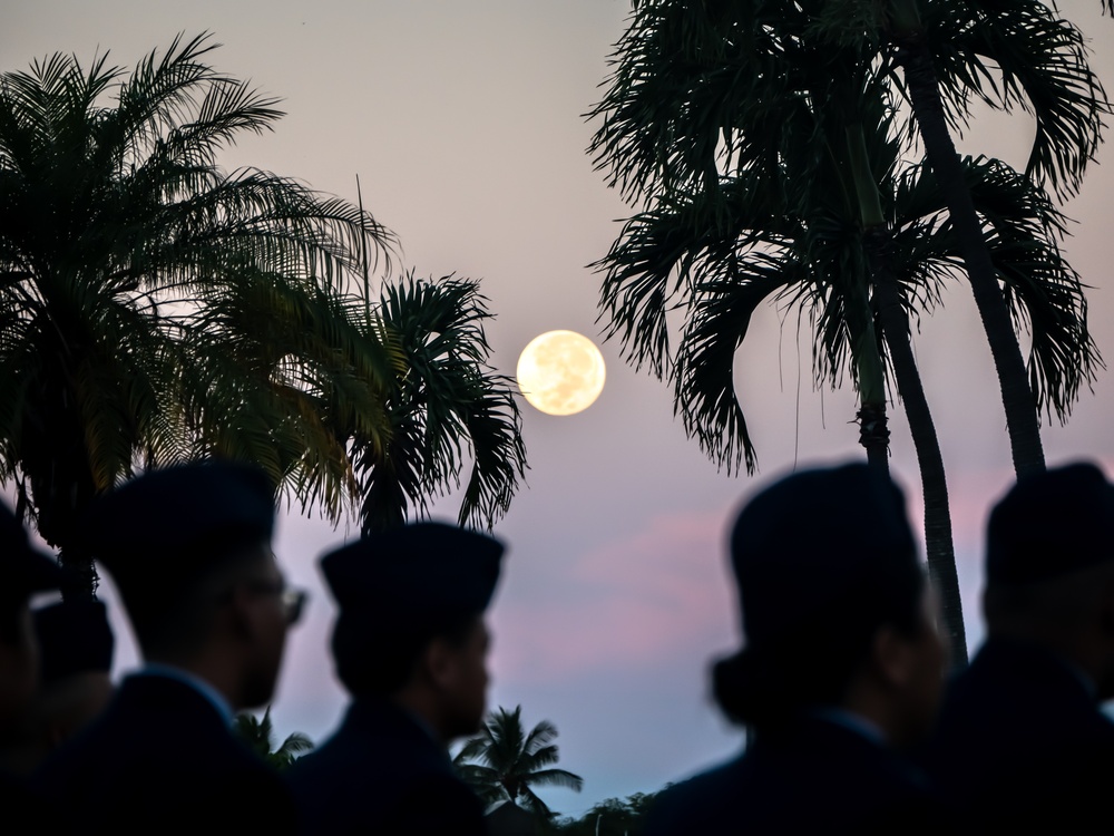 Harvest moon appears during role call