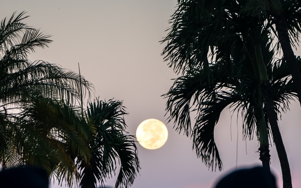 Harvest moon appears during role call