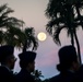 Harvest moon appears during role call