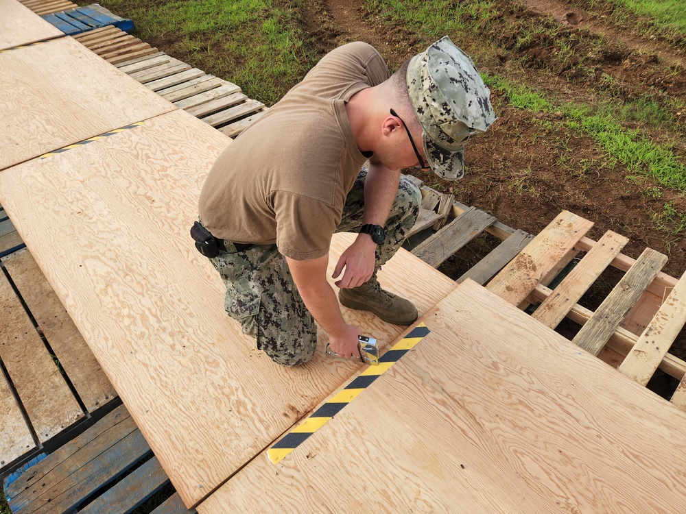 Seabees Create a Walkway for Pacific Vanguard's Expeditionary Maritime Operations Center