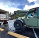 Seabees unload supplies for Mobile Diving and Salvage Unit One