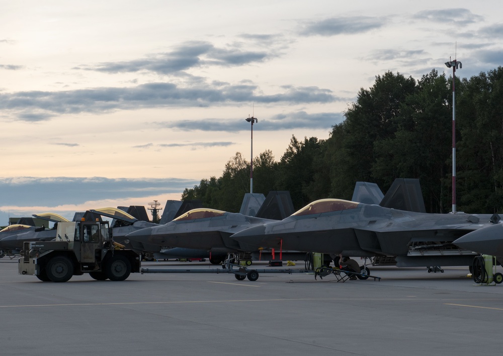 90th AMXS tow F-22 for maintenance