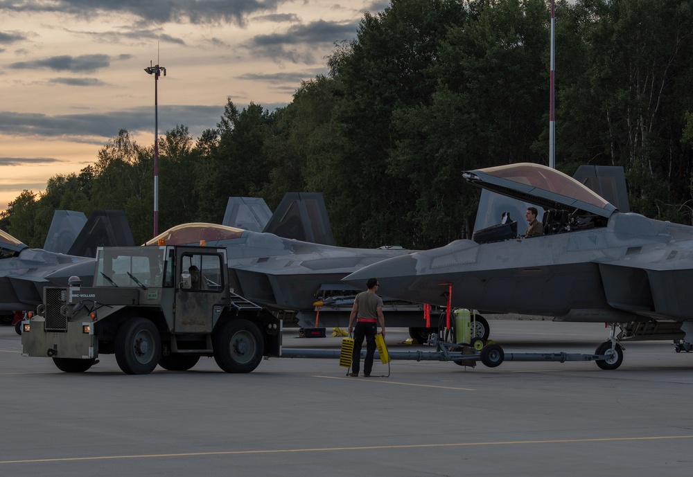 90th AMXS tow F-22 for maintenance