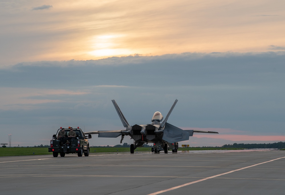 90th AMXS tow F-22 for maintenance